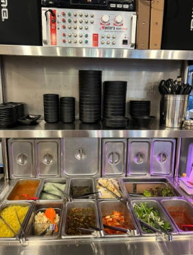 Free Korean Side Dishes (Banchan) Refills at Restaurants A self-service banchan bar (반찬 셀프바) where diners can choose side dishes and refill their plates.