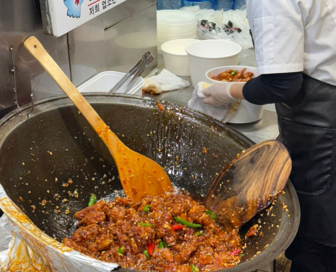Dakgangjeong is Korean fried chicken cut into bite-sized pieces, fried until crisp, and coated in a sticky glaze.